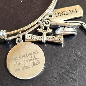 Silver tone Adjustable Bangle with graduation charms